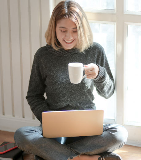 Online care recieved by a woman accessing telehealth services with her computer